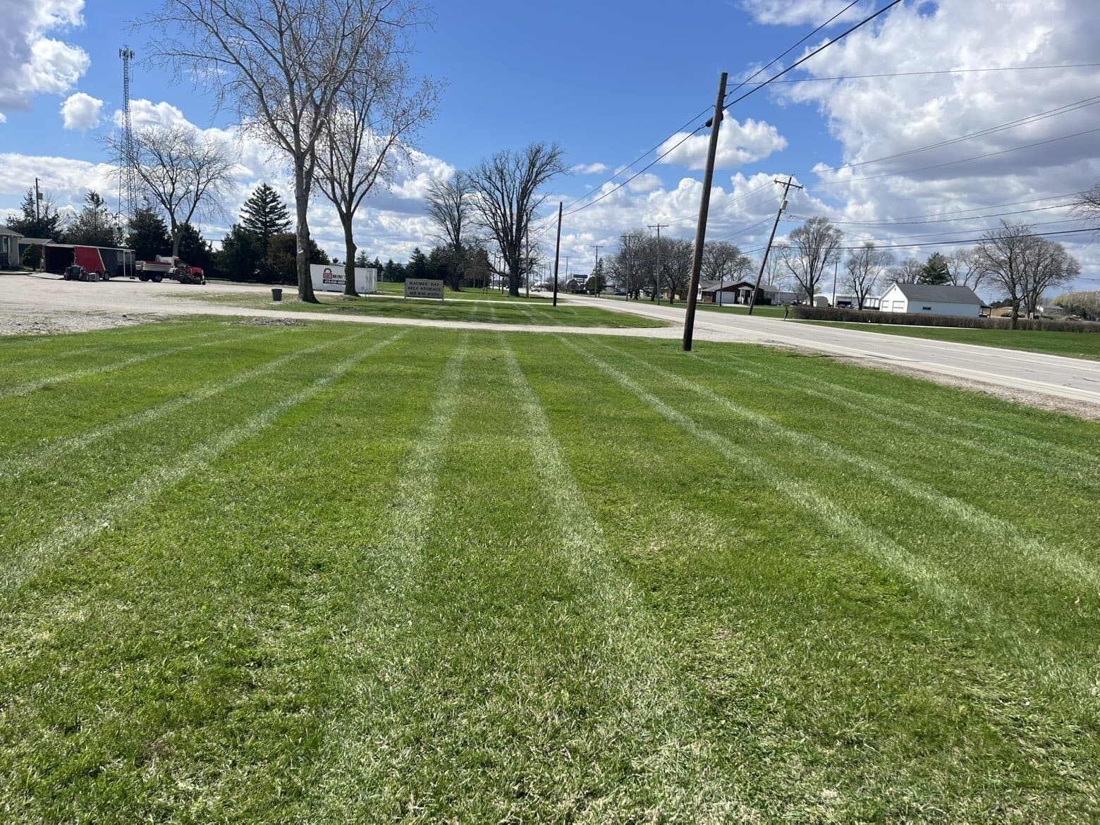 Clean Edge striped commercial lawn beside a roadway